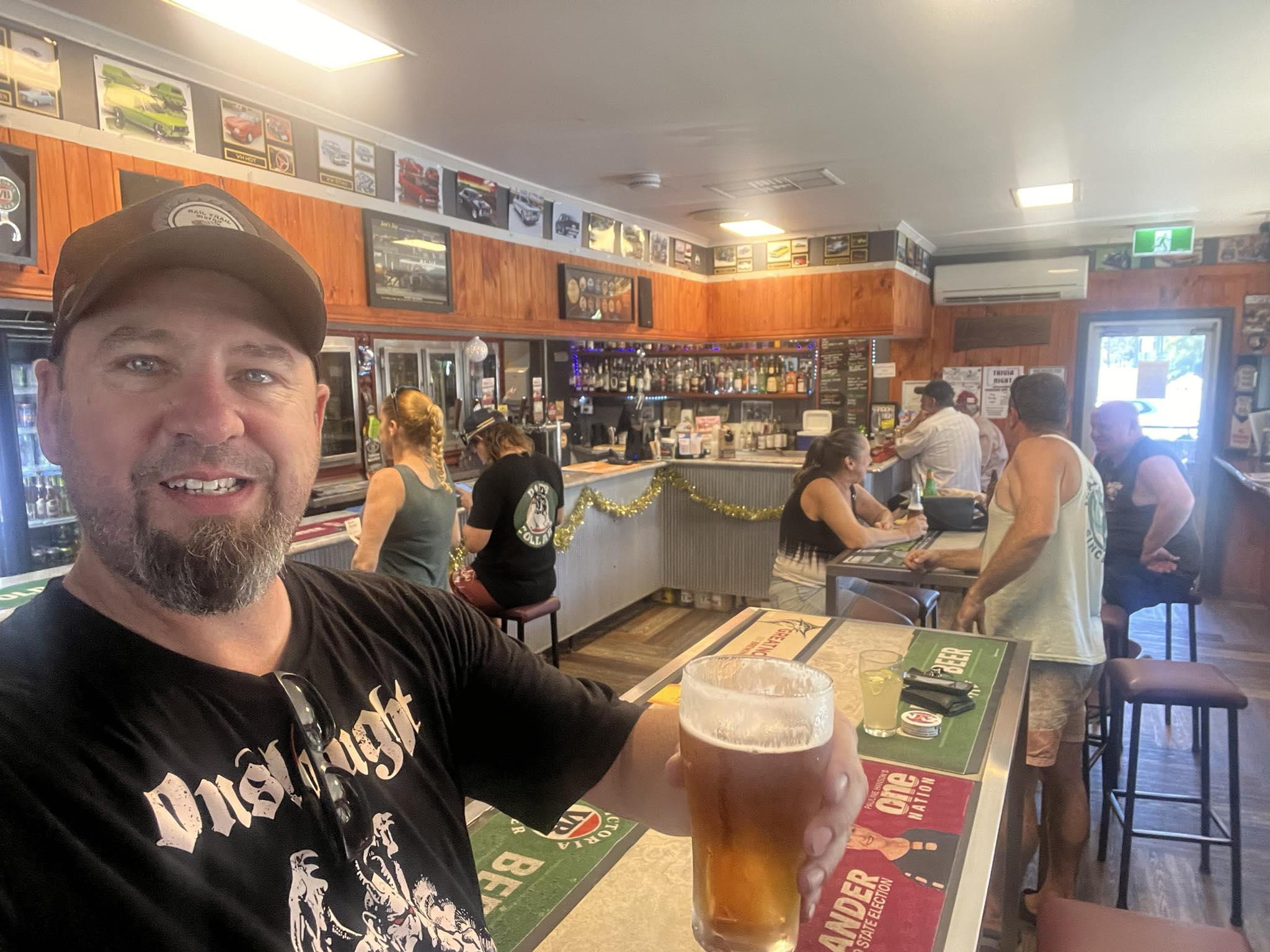 Cold pint of beer on a wooden bar at the Coominya Pub